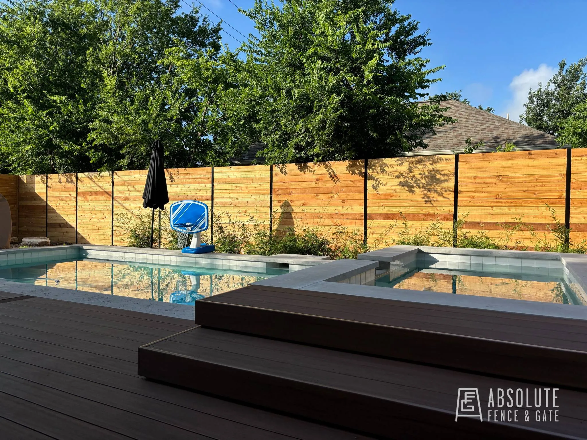 Horizontal cedar fence installation by Absolute Fence & Gate in Austin